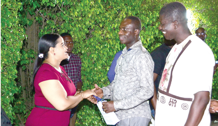 Mrs Yvonne Eyeson (left) engages some of the clients present Mrs Yvonne Eyeson (left) engages some of the clients present